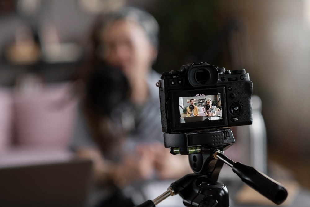 Business Videos Production Hwy 90a Commercial Park – recording a podcast interview with a professional camera on tripod