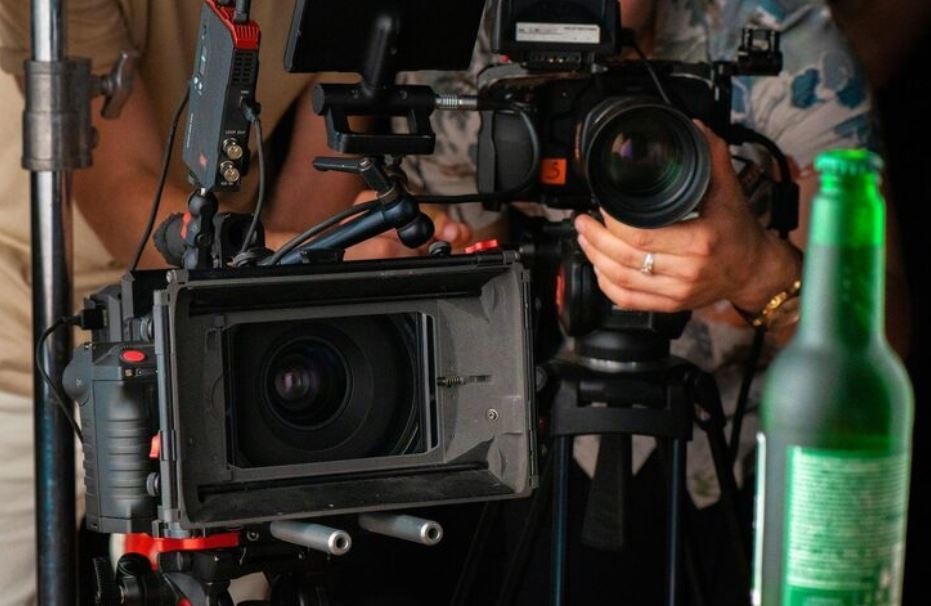 A close-up of professional video cameras and production equipment on a set, ready to film a product for a Corporate Video Production company in Woodbridge