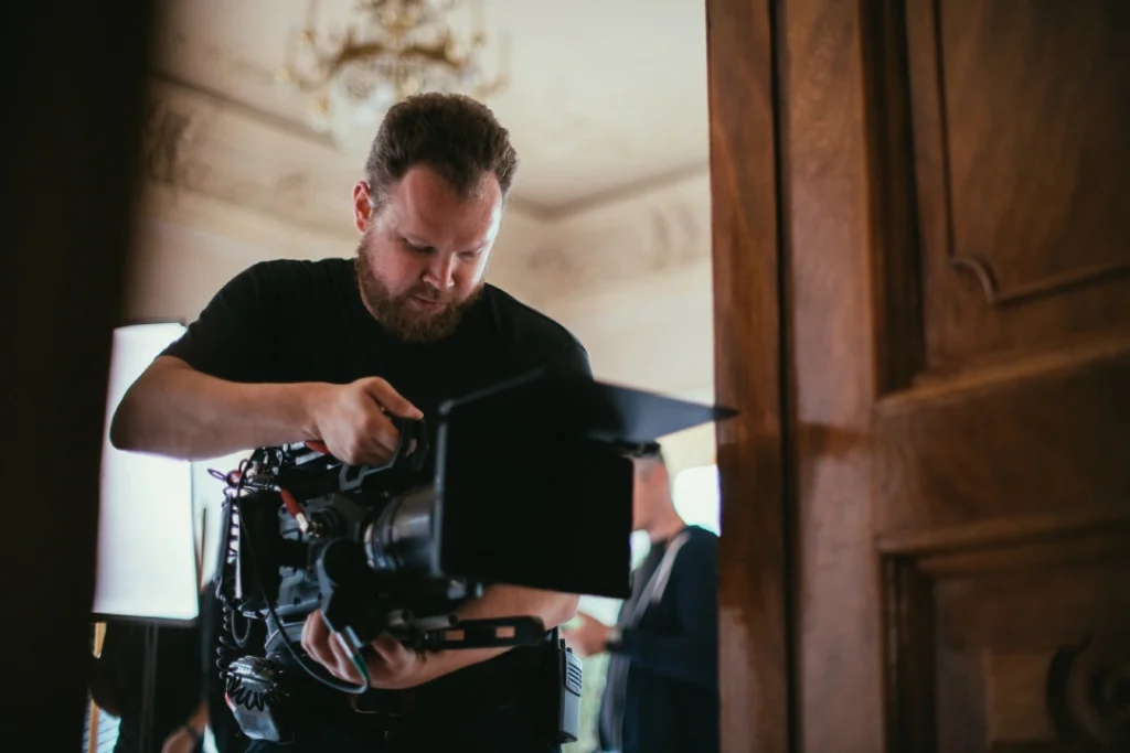 Cinematographer captures elegant interior scene for commercial video production Sugar Land in formal filming location