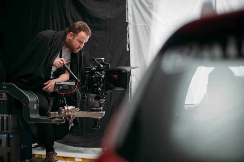 Cinematic car scene filmed by Commercial Video Production Company Sugar Land using crane-mounted camera equipment.