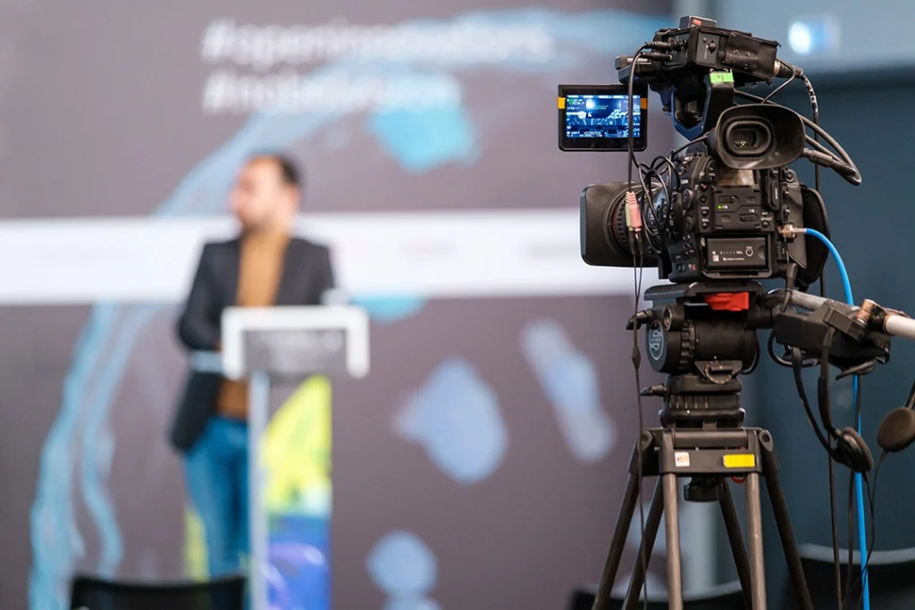 Corporate video production agency Sugar Land: Director guiding actor during shoot at UTurn Productions, creating polished business videos in Sugar Land.