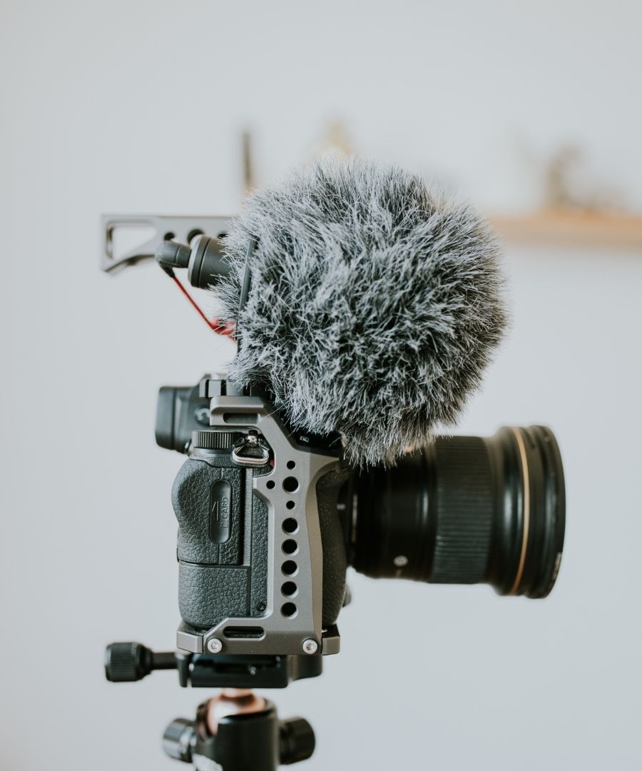 Professional camera rig with shotgun microphone and deadcat windscreen used for affordable business video production in Sugar Land.