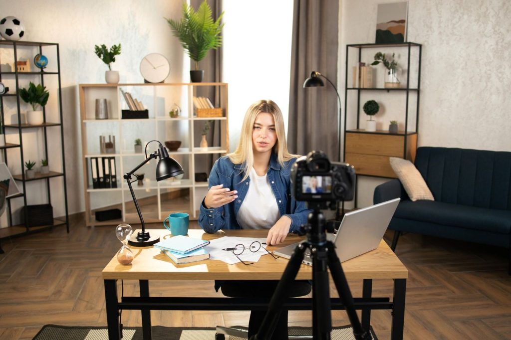 Business consultant using a business videos company Sugar Land to film high-quality online sessions in a home office.