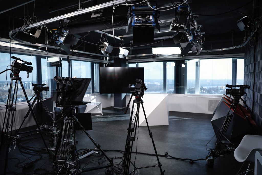 Professional studio lighting and camera setup at a premier corporate video production company Sugar Land facility.
