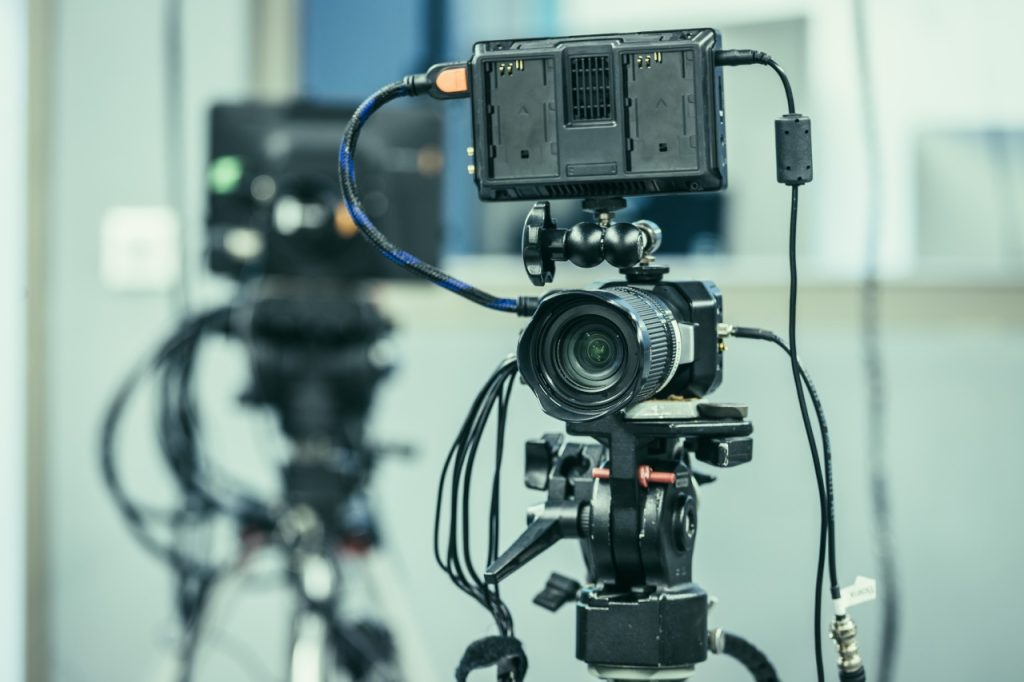 Professional 4K cinema camera on a tripod used by a top corporate video production company Sugar Land to film.