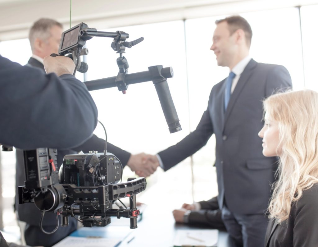 Corporate handshake captured on a camera rig by a professional video production company Sugar Land for a client.