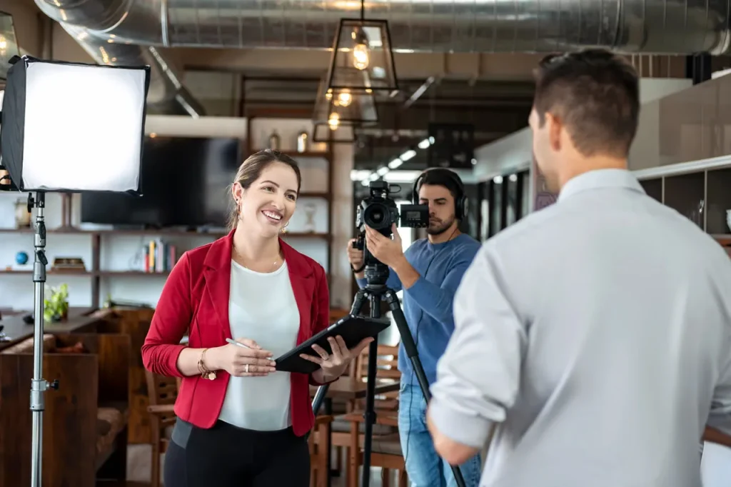 Expert interview being filmed by a corporate video production company Sugar Land with professional lighting and camera setup.
