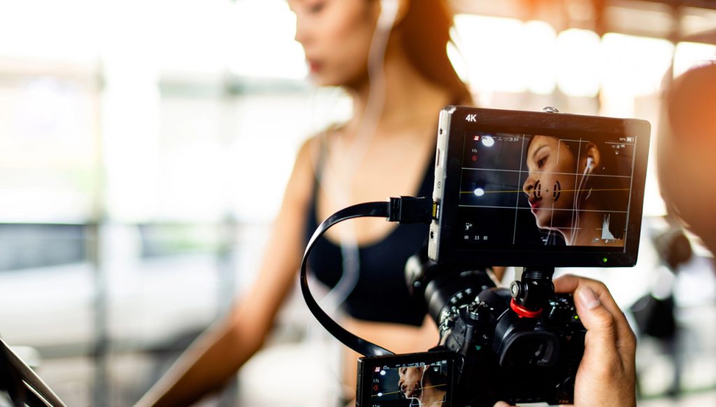 Professional 4K fitness cinematography being captured by a top-tier promotional videos agency Sugar Land expert.