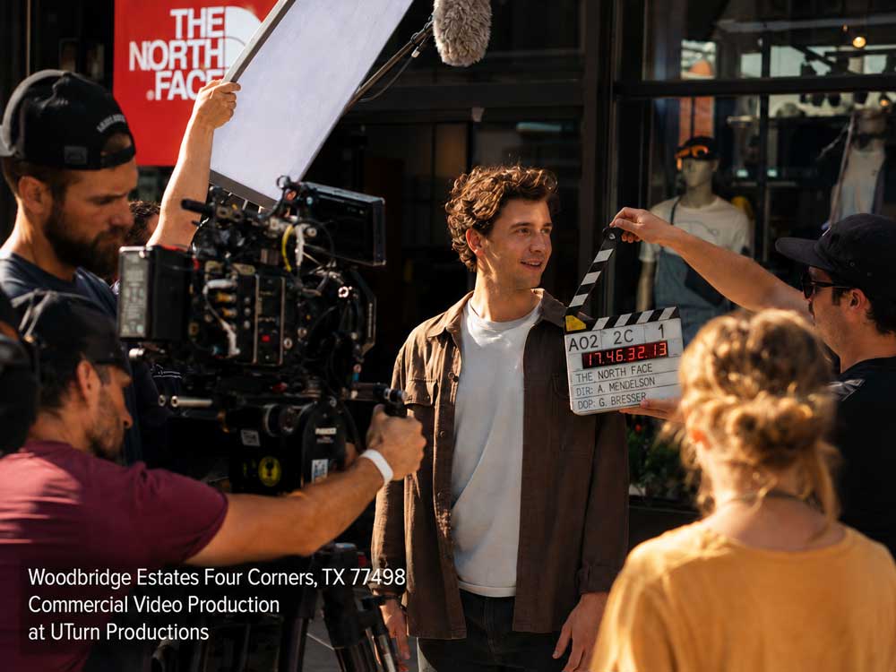 An outdoor retail commercial shoot with a camera crew, using top commercial video production sugar land teams.